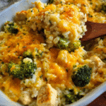 cheesy chicken broccoli rice casserole baked with cheddar and crispy topping