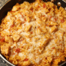 cheesy chicken pasta skillet served hot with melted cheese