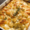 Golden cheesy creamy potato casserole baked with cheddar and mozzarella