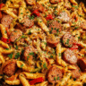 Creamy Cajun sausage pasta served with Parmesan and parsley