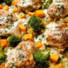 Creamy garlic butter vegetables with roasted broccoli squash and chicken in a skillet