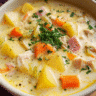 Creamy ham and potato soup with cheddar cheese and potatoes