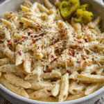 Creamy pepper jack pasta served warm with melted cheese sauce and penne