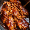 Slow cooker BBQ pulled chicken served on a toasted bun