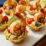 Avocado shrimp cups served in crispy phyllo shells with tomatoes and Greek yogurt