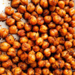 Bowl of roasted chickpea mix seasoned with sumac and smoked paprika